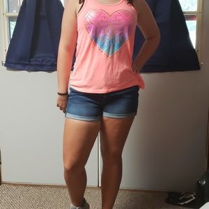 A orange heart tank top